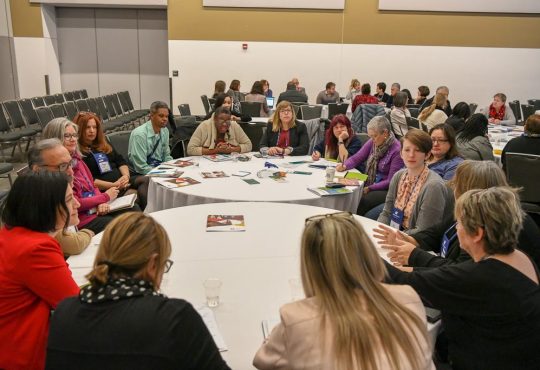 people sitting at round tables at CERIC's Cannexus19 conference