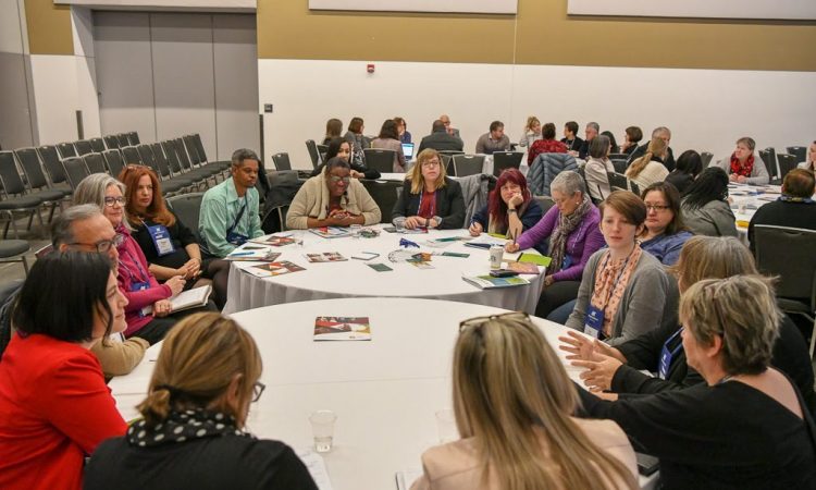 people sitting at round tables at CERIC's Cannexus19 conference