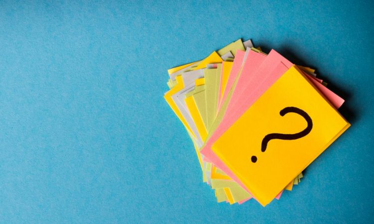 sticky notes with a question mark written on one