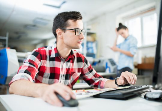 young man using computer