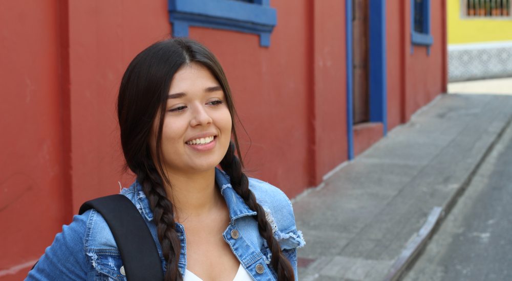 Teen girl wearing backpack