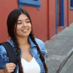Teen girl wearing backpack