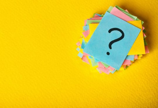 sticky notes with question mark on top