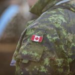 canadian soldier shoulder in camo with canadian flag