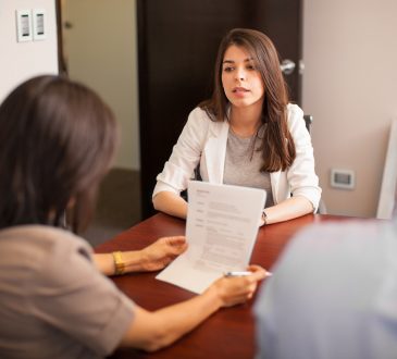woman looking stressed during job interview