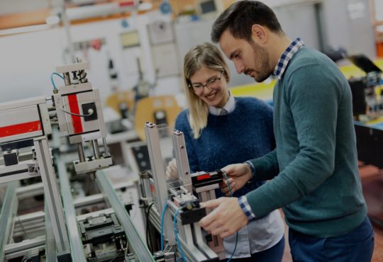 male and female engineering students working