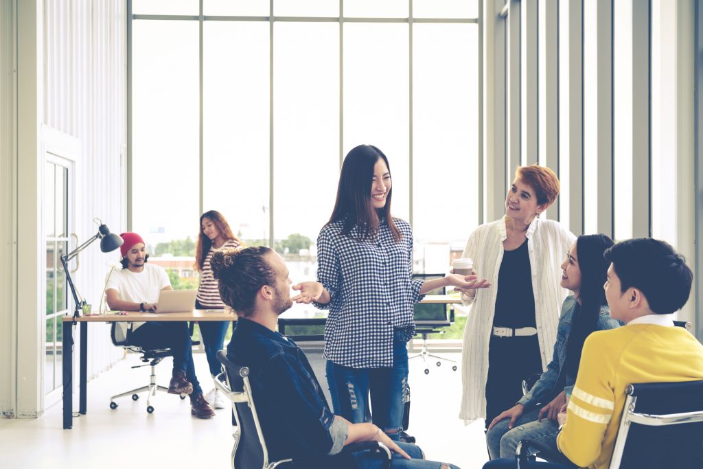 people dressed casually in office