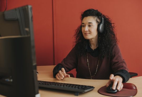 woman watching webinar