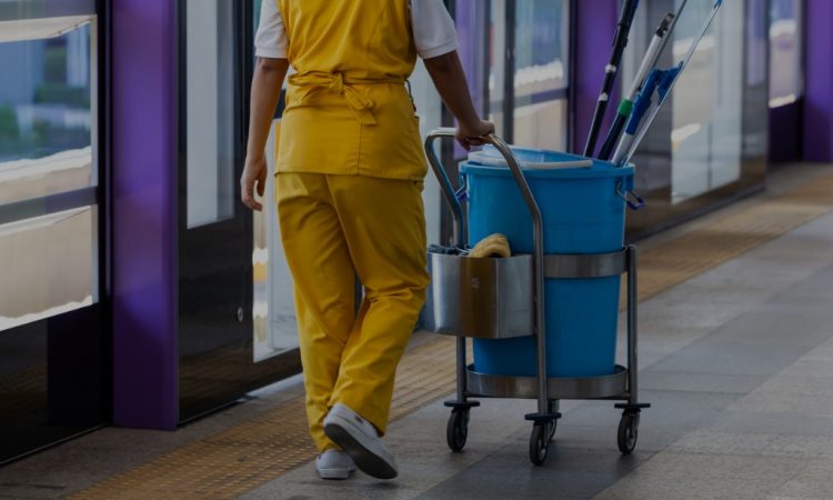 female janitor at transit station