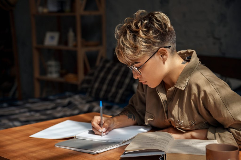 young woman sitting at desk