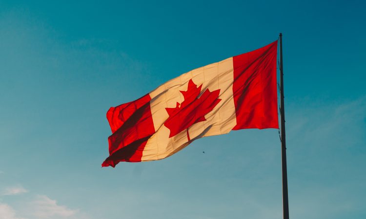 canadian flag waving in wind