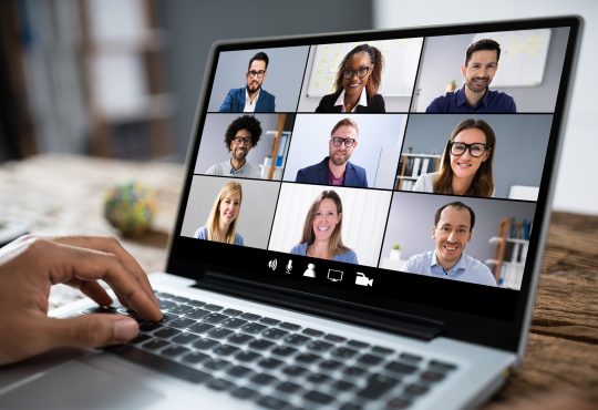 laptop screen with grid video call