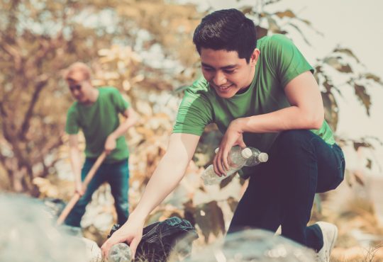 Volunteers picking up litter in the park