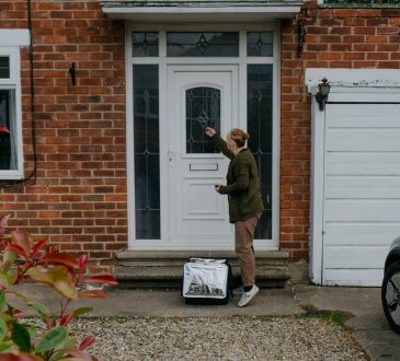 food delivery woman knocking on house door