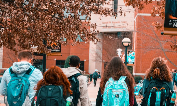 Group of students walking on university campus