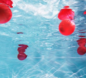 balloons floating in pool