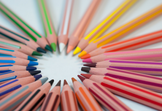 colourful pencil crayons arranged in a circle