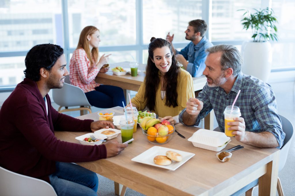 co-workers having lunch together