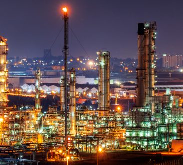 Oil refinery and​ industrial​ city​ After sunset