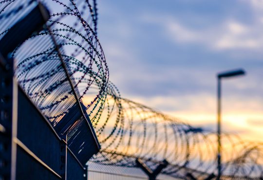 barbed wire on prison fence