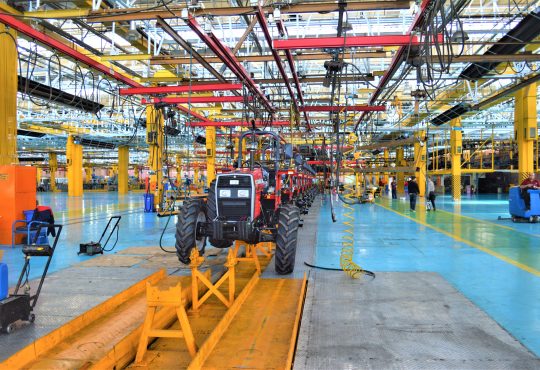 tractor on assembly line in factory