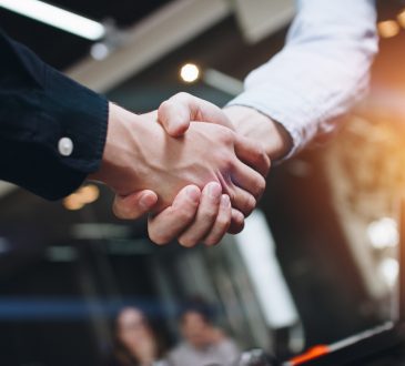 closeup of handshake in office