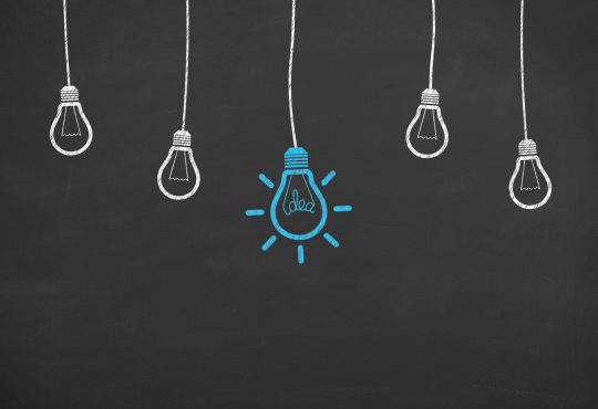 lightbulbs drawn on chalkboard background