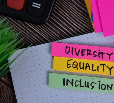 Diversity Equality Inclusion written on a sticky note on desk