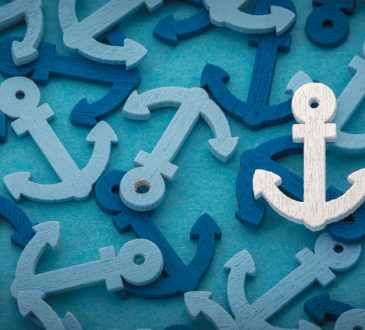 Background image of many blue and teal coloured anchors