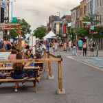 Busy Montreal street filled with pedestrians.