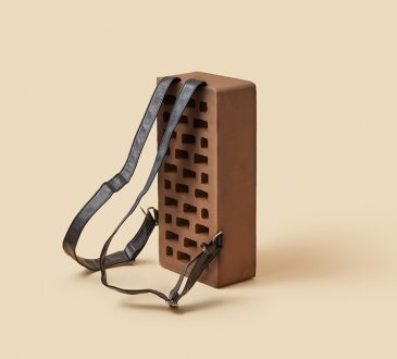 Backpack straps attached to brick