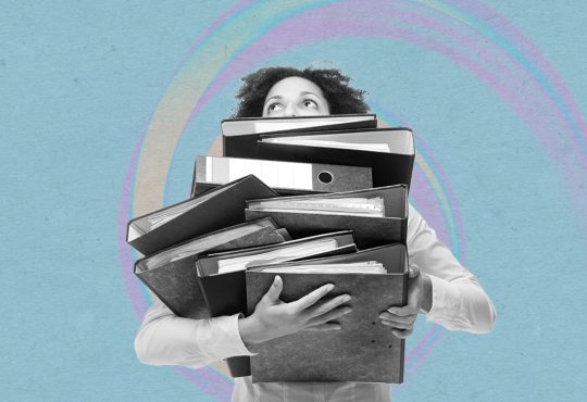 Photo illustration of woman carrying large stack of binders