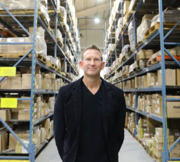 Lee Valley Tools CEO standing in warehouse.