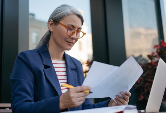 Woman looking at papers