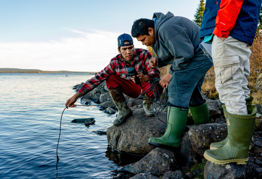 Interns in the Environmental Water Program sampling water as part of a project in collaboration with Sheshatshiu Innu First Nation in Labrador