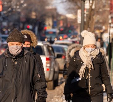 Pedestrians walking in winter in Montreal.
