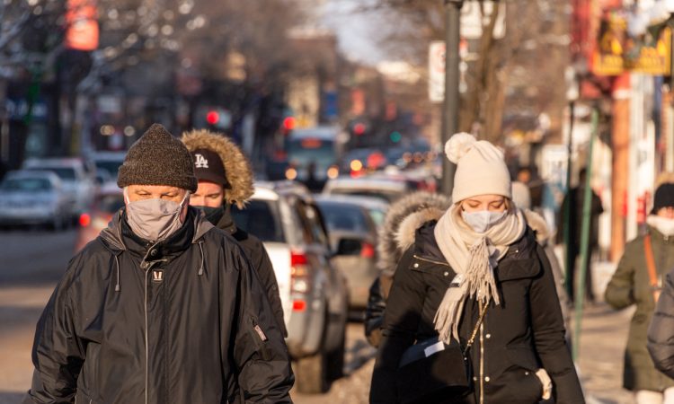 Pedestrians walking in winter in Montreal.
