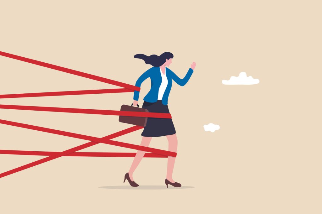 Illustration of businesswoman trying to break through red tape holding her back