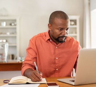 Man working on laptop at desk