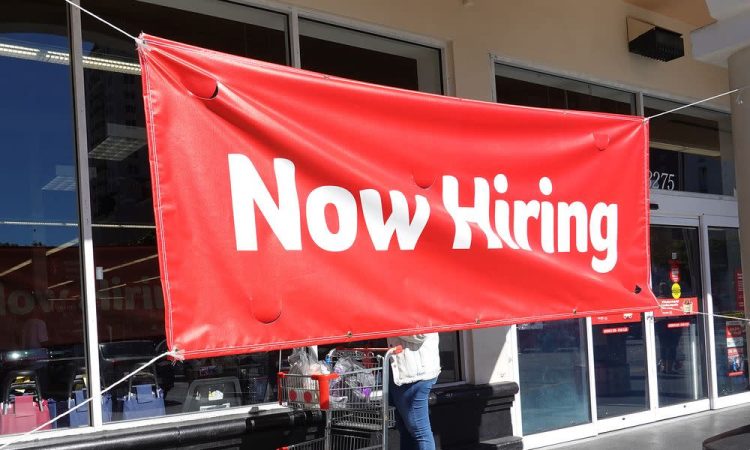 Now hiring banner outside of store
