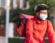 Food delivery driver on bike.