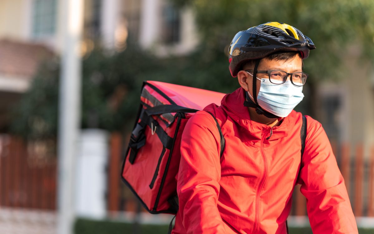 Food delivery driver on bike.