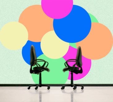 Two office chairs facing each other on illustrated background of colourful circles