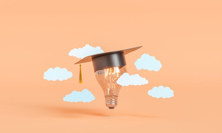 Photo illustration of lightbulb wearing graduation cap amid floating white clouds on peach background