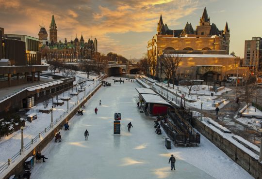 People skating on the Rideau Canal in Ottawa