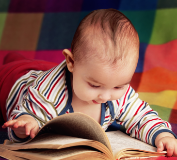 Baby reading novel