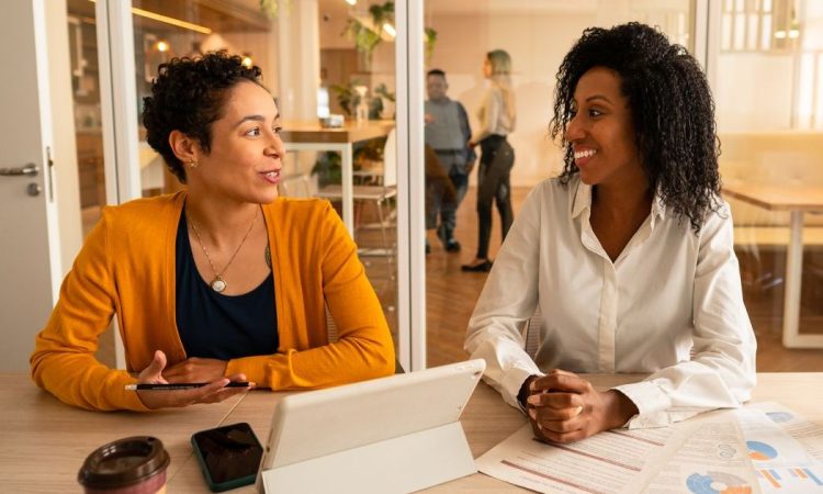 Two people meeting in office