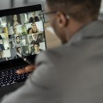 Person on video call on laptop