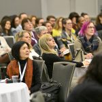 People attend a session at the Cannexus24 conference.