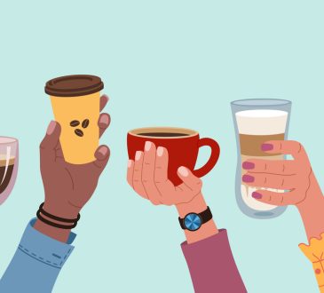 Diverse hands holding up cups of coffee